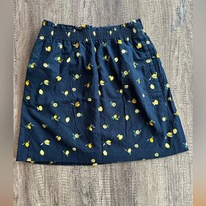 J. Crew Factory navy blue skirt with lemon print. Excellent condition. Size 4.